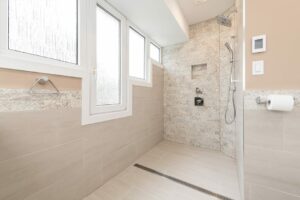 image of an accessible shower, with a light coloured modern design