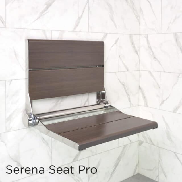 Medium wood SerenaSeat Pro on a white marble tile wall